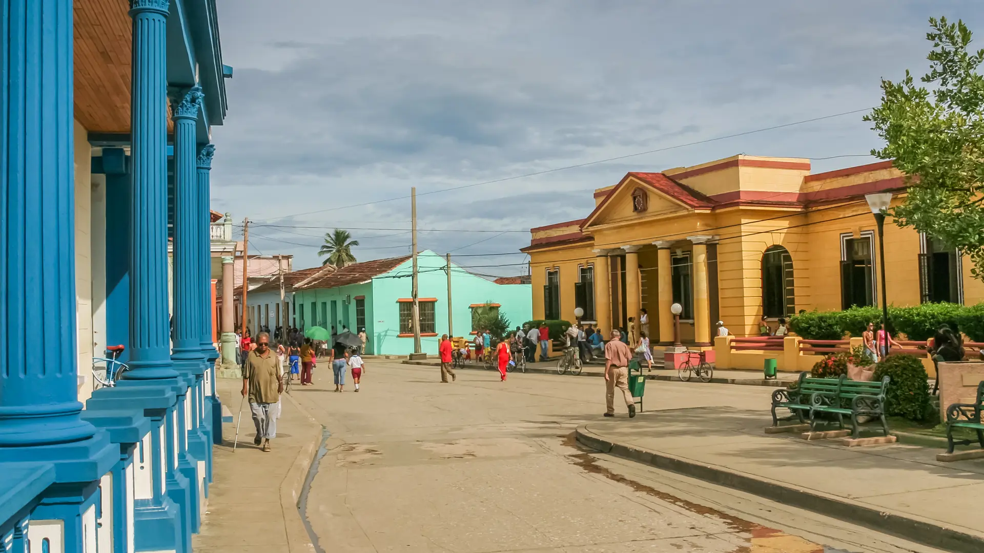 shutterstock_451773604 Street with colorful houses in colonial town Baracoa, Cuba.jpg