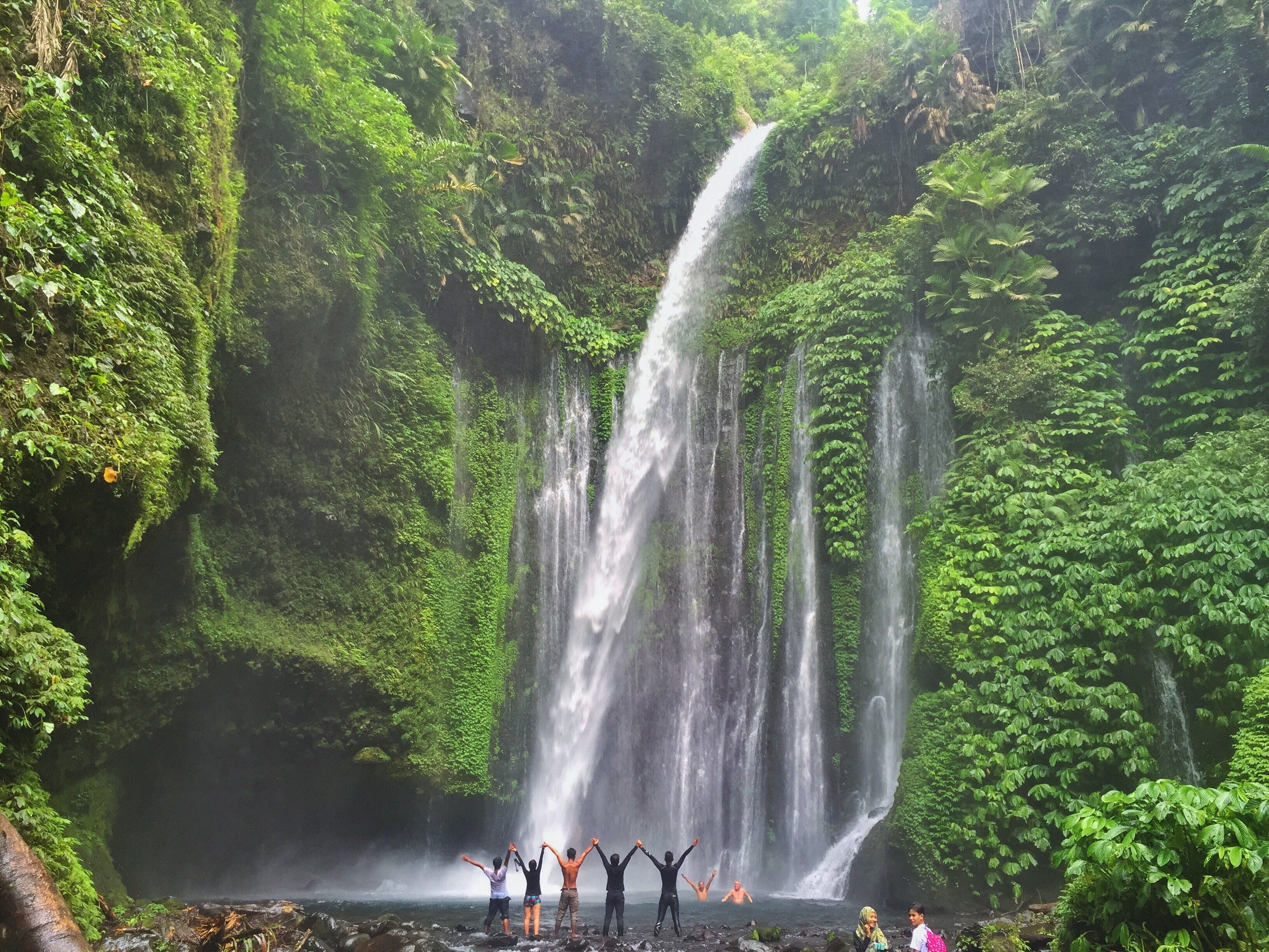 shutterstock_544327681 Tiu Kelep, LOMBOK - 19 November 2016 A group of people at the famous waterfall in lombok, Indonesia..jpg
