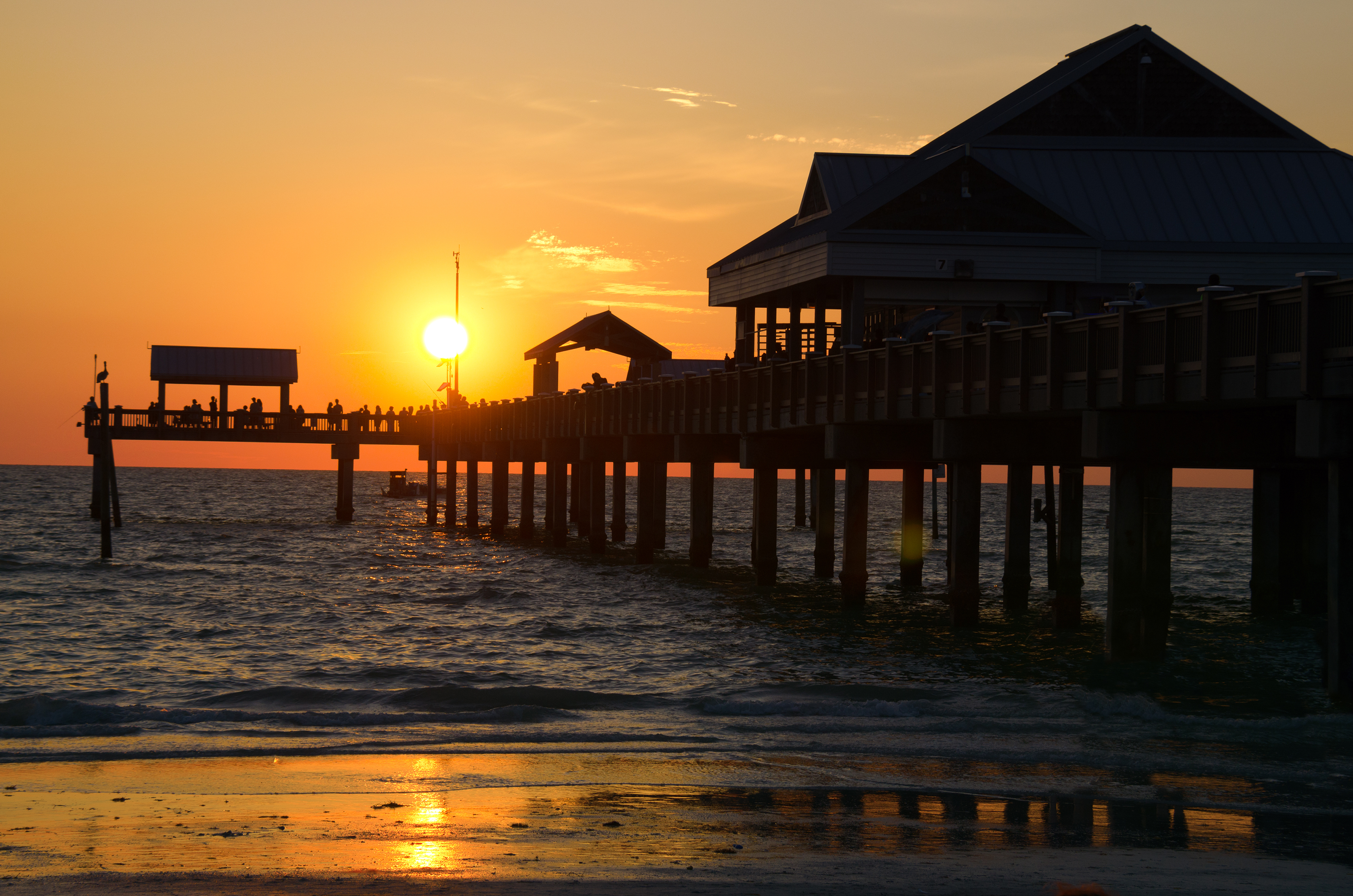 Solnedgang ved molen i Clearwater Beach - shutterstock_411035167.jpg