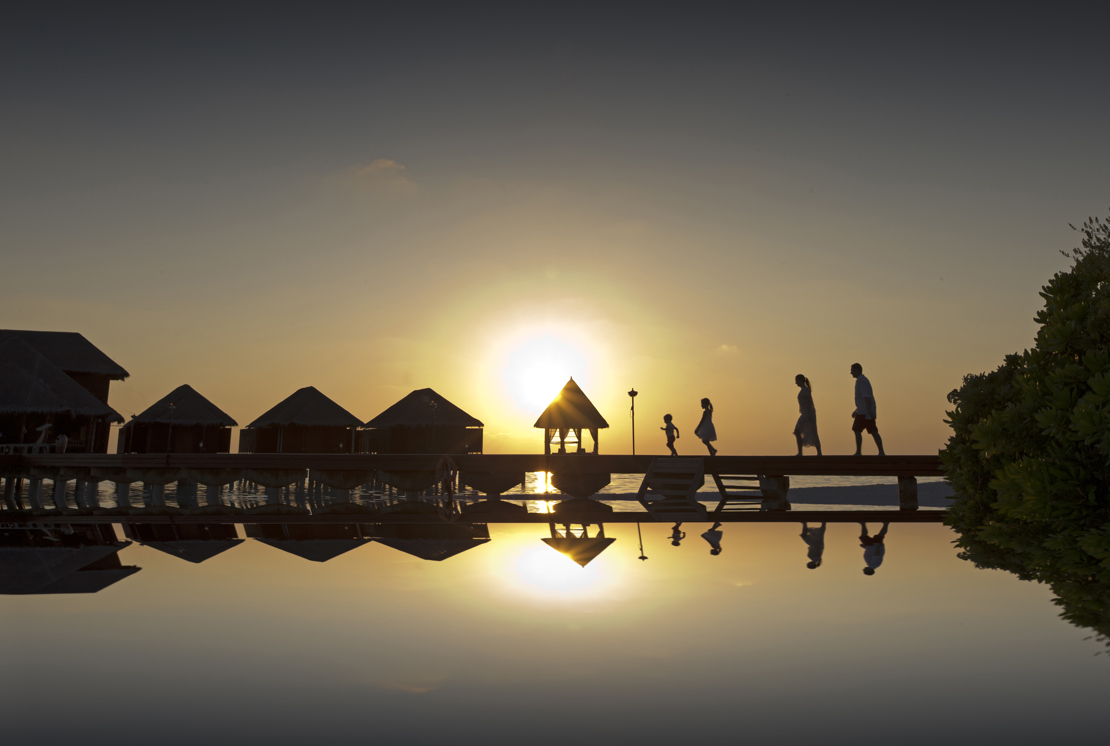 61835534-H1-Family_on_boardwalk_at_Dhigu.jpg