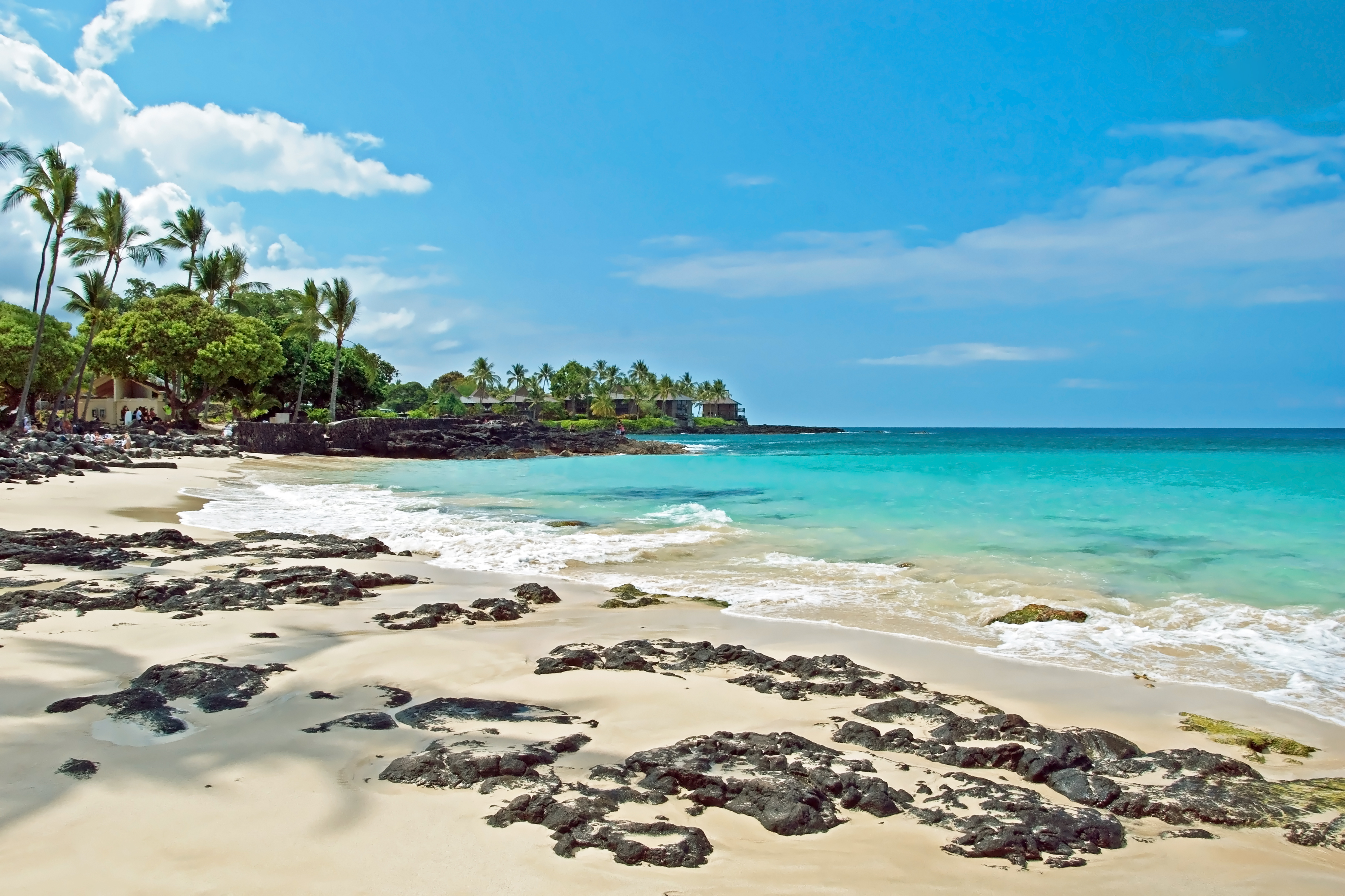 shutterstock_167611097 White sand beach on Hawaii Big Island with azure ocean in background.jpg