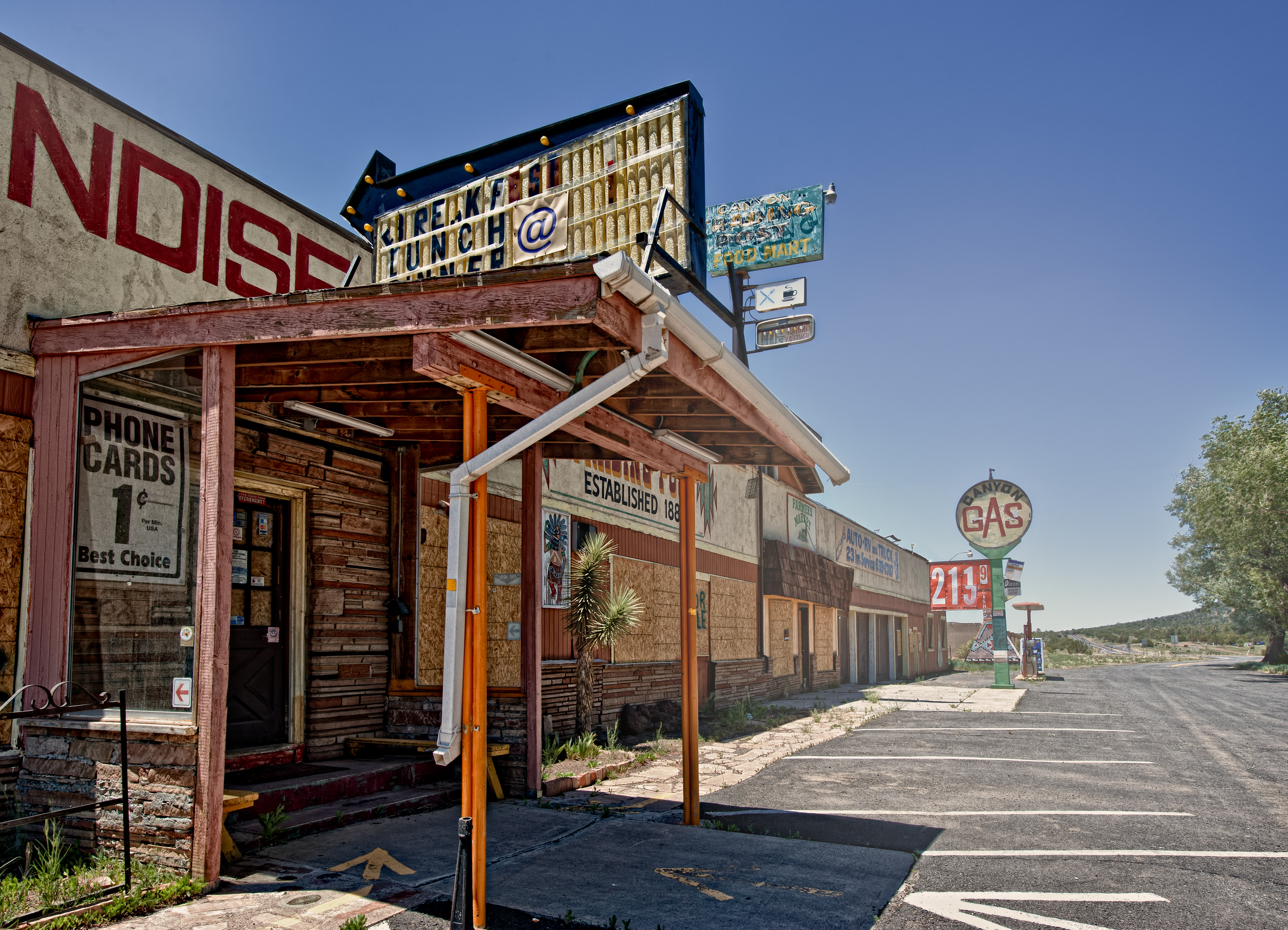 shutterstock_70710727 Picture of an abandoned post and gas stantion close to Williams, in Arizona.jpg