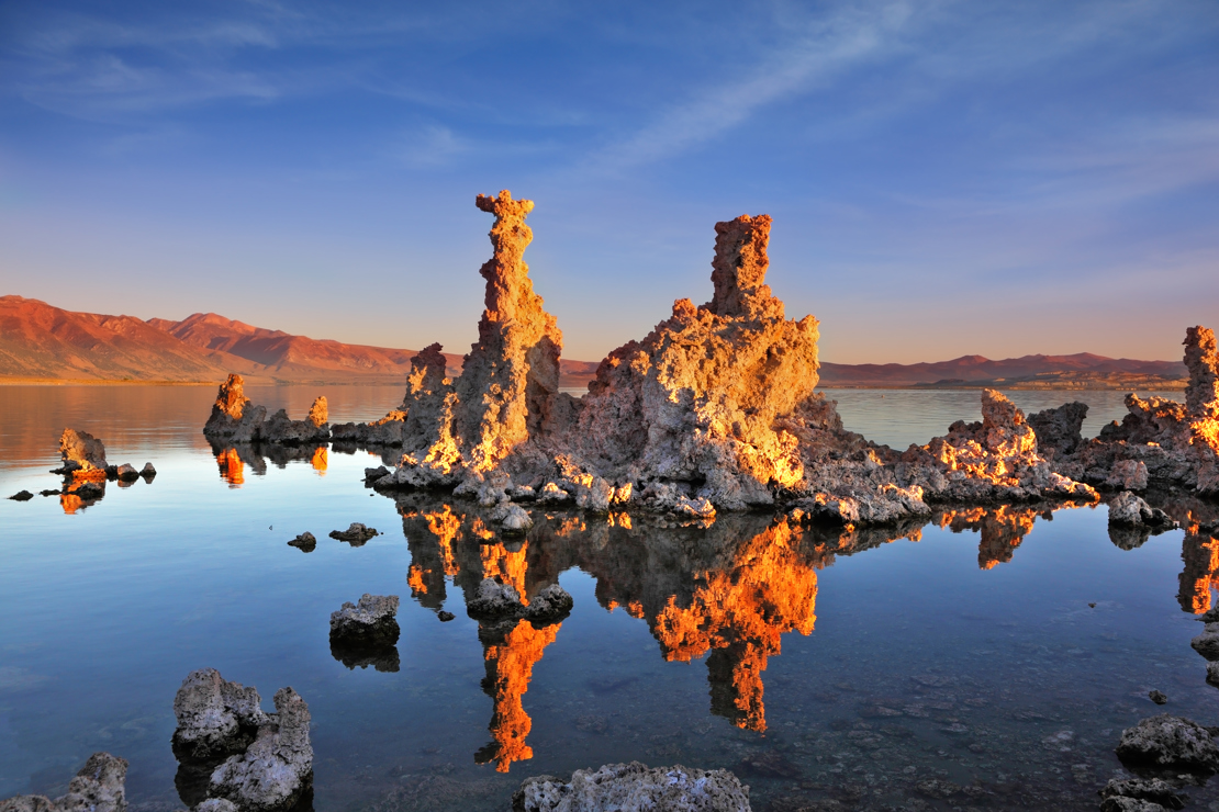shutterstock_165523355 Mono Lake.  bizarre calcareous tufa formation on the smooth water of the lake..jpg