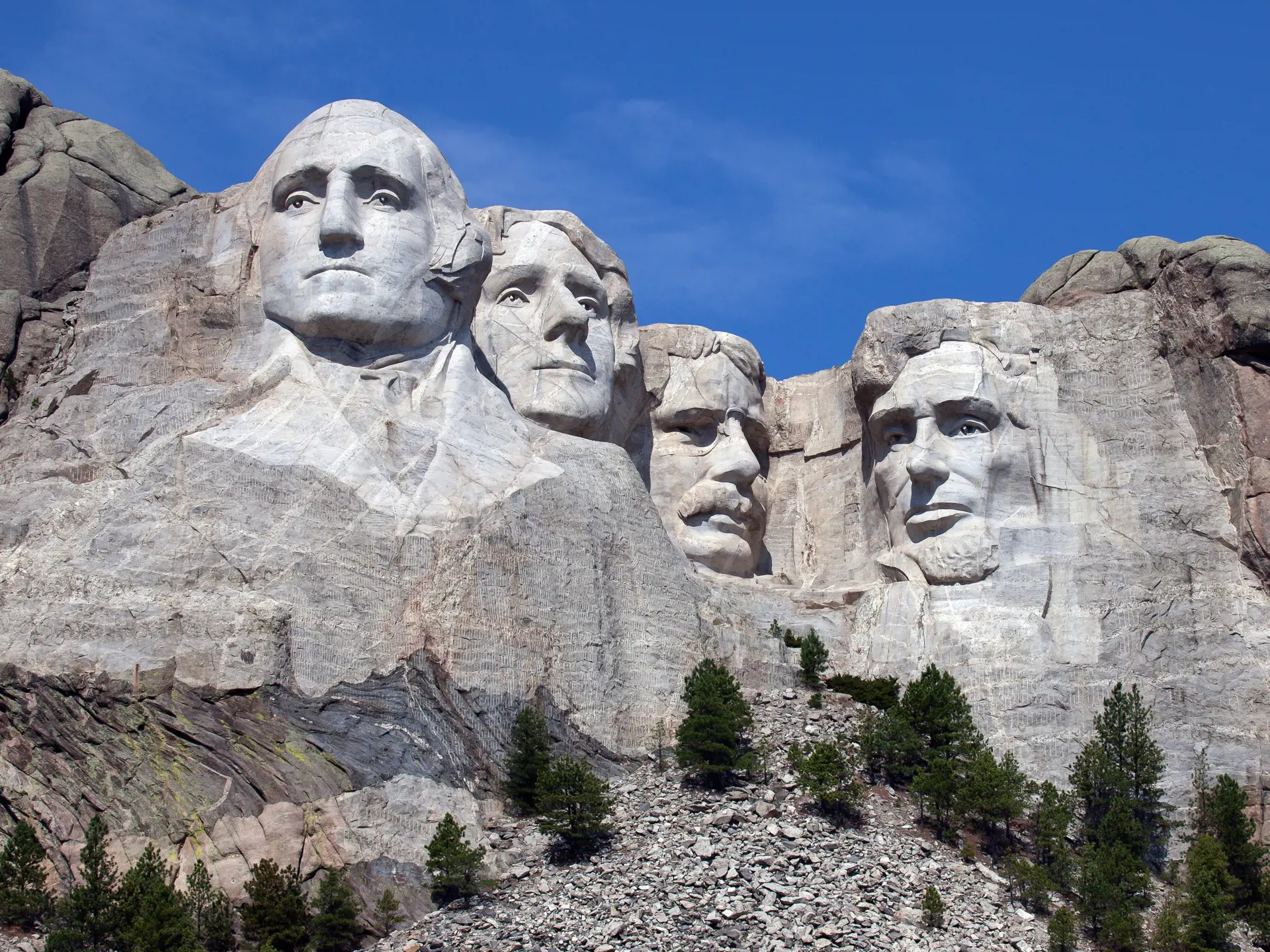 MOUNT RUSHMORE - de fire enorme præsidenter er vel nok et af de mest spektakulære af de menneskeskabte nationale monumenter i USA, Check Point Travel