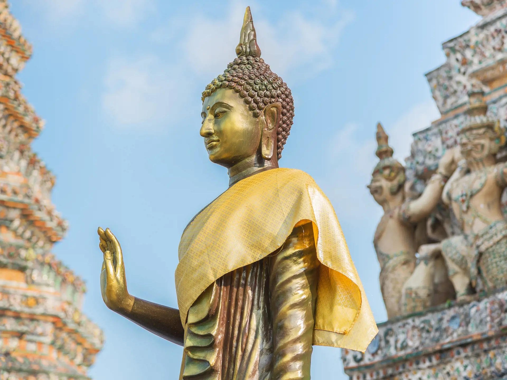 shutterstock_240628846 Thai Buddha a stupa, Golden sculpture, Wat Arun temple in Bangkok, Thailand..jpg