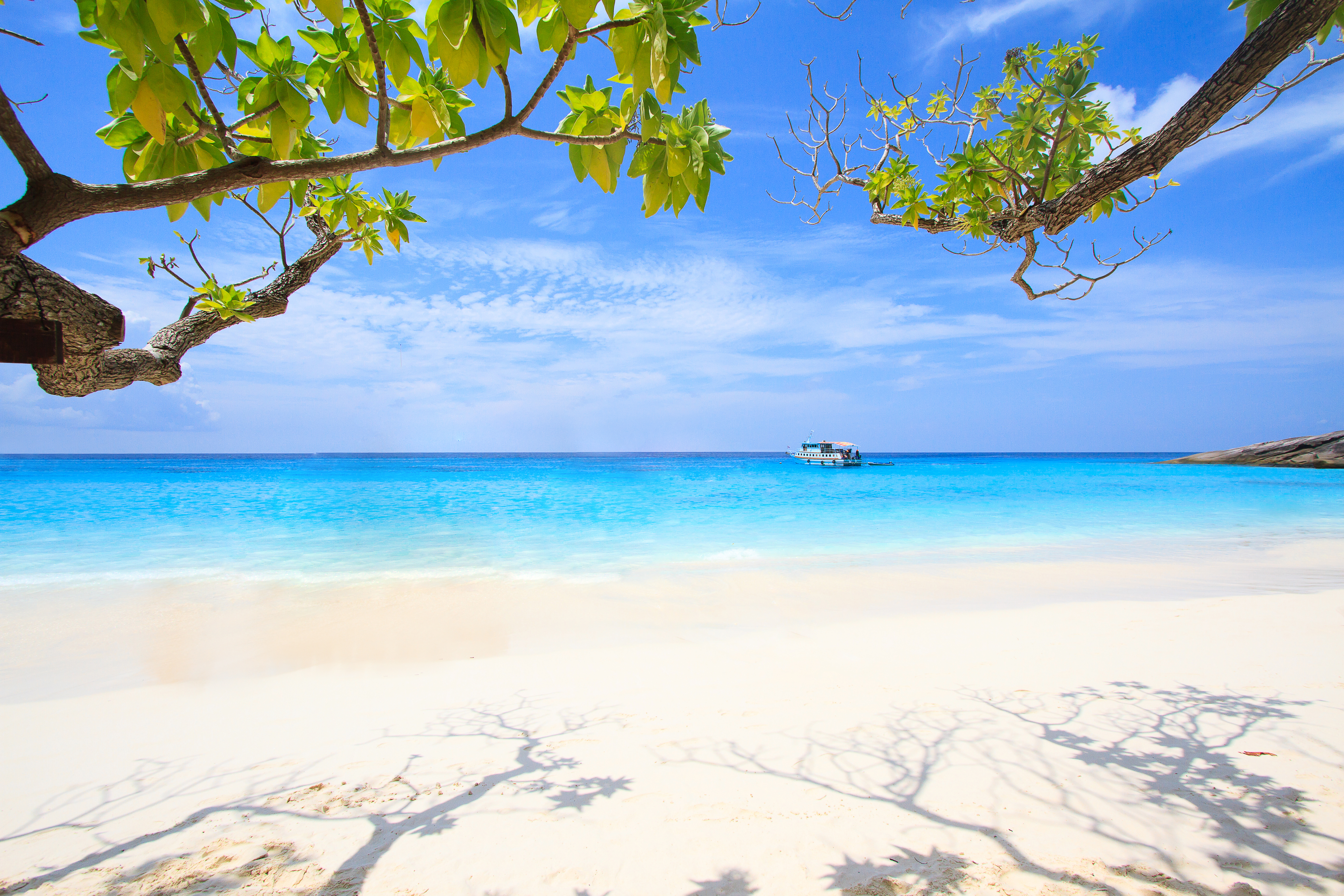 shutterstock_377907184 beautiful similan island like a heaven with blue sky and calm blue sea surf, Phang-nga, Thailand.jpg