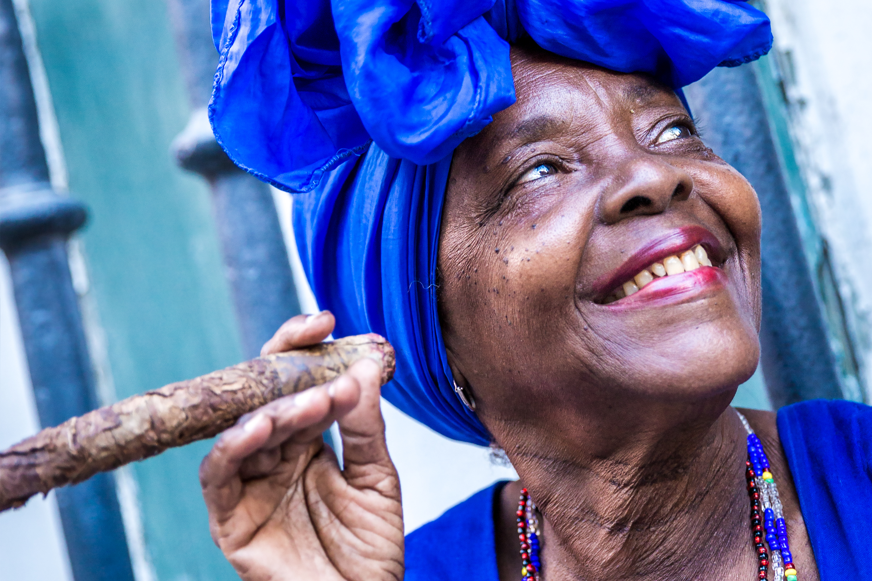 shutterstock_301377860 Portrait of african cuban woman smoking cigar in Havana, Cuba.jpg