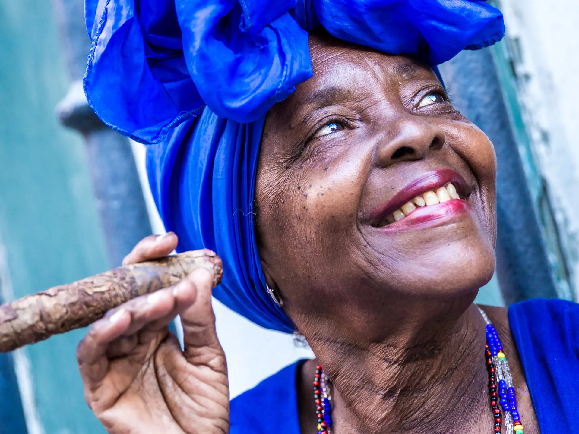 shutterstock_301377860 Portrait of african cuban woman smoking cigar in Havana, Cuba.jpg