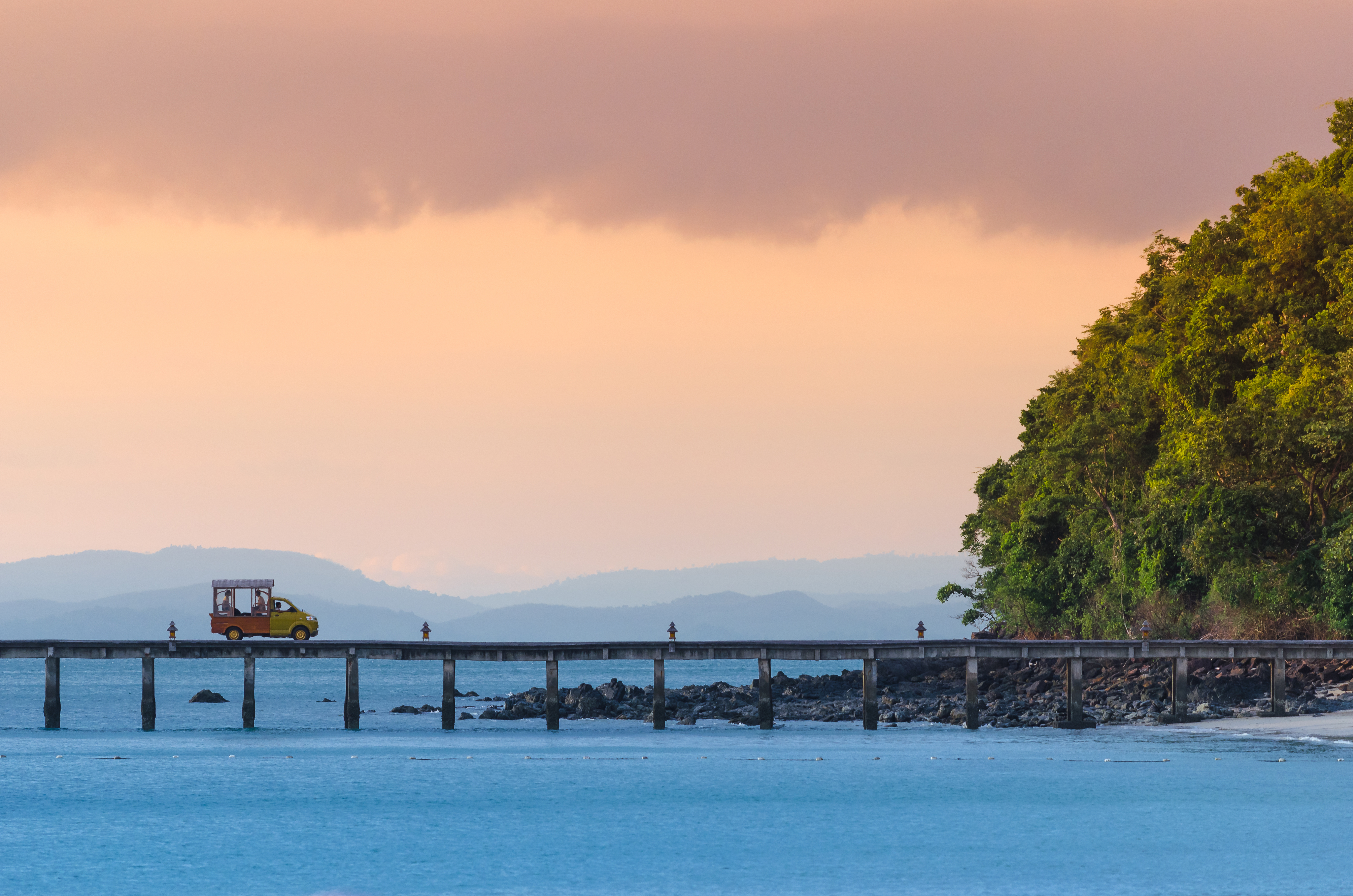 shutterstock_241066516 Mini cute pickup drive on the bridge over the sea at Koh Yao Yai, Phang Nga province of Thailand.jpg
