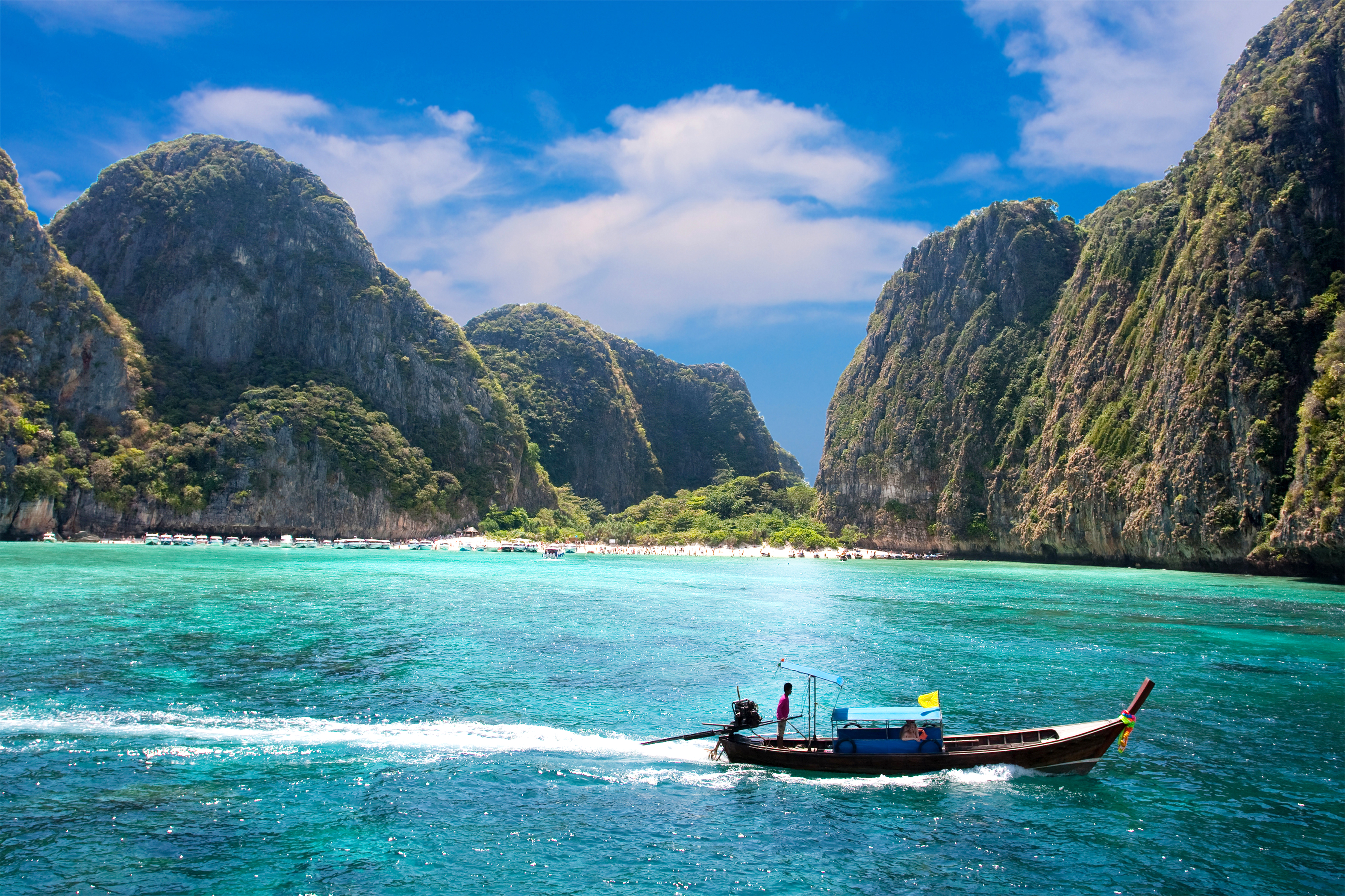 ØHOP - Når man sejler i den sydthailandske skærgård, er det med udsigt til øer med små vige omgivet af palmer og høje kalkstensbjerge, Check Point Travel