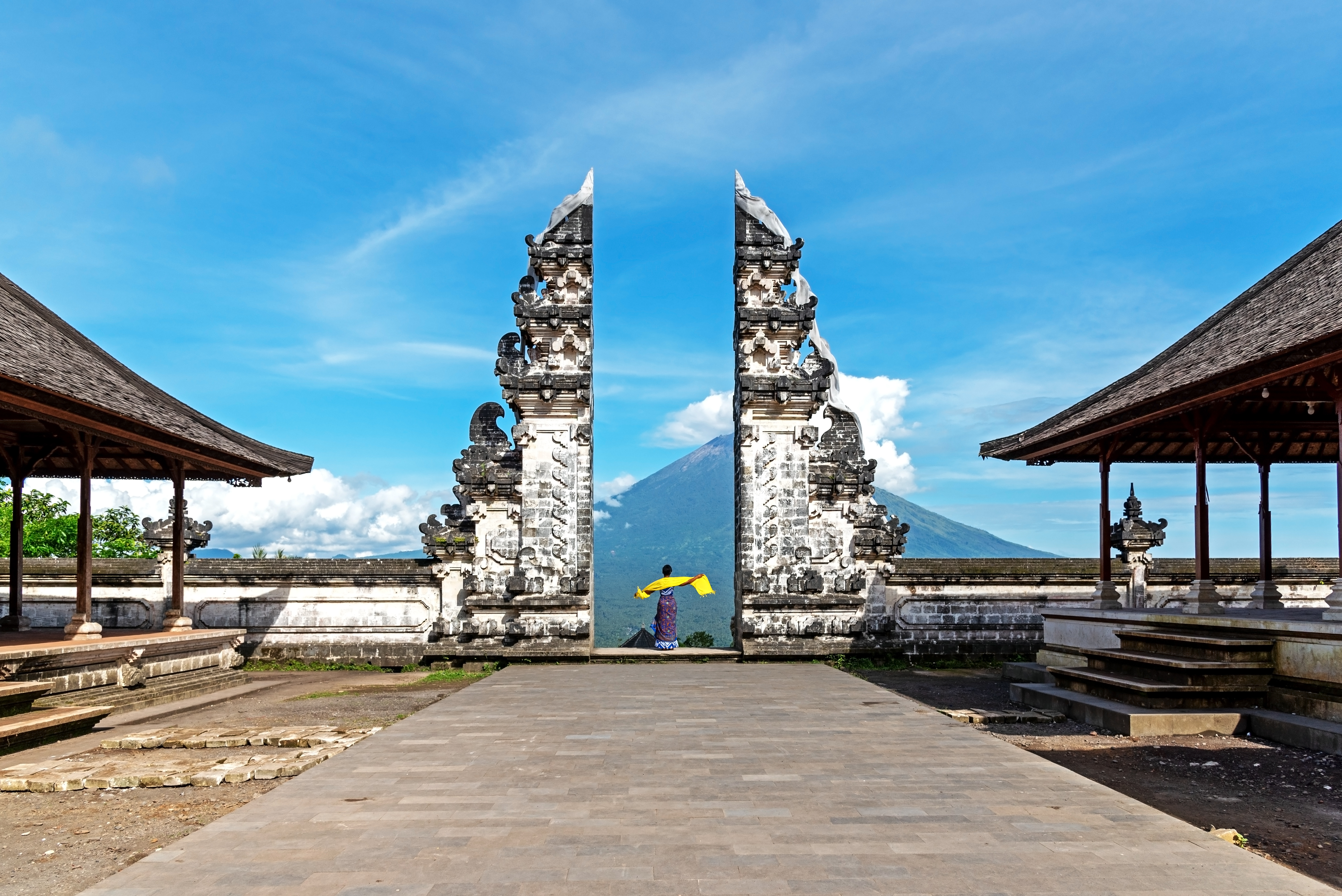 Shutterstock 1431231599 (Unidentified Woman At Gate At Pura Lempuyang Luhur With Mr Agung Volcanic View, Sacred Hinduism Temple In Bali Indonesia. )