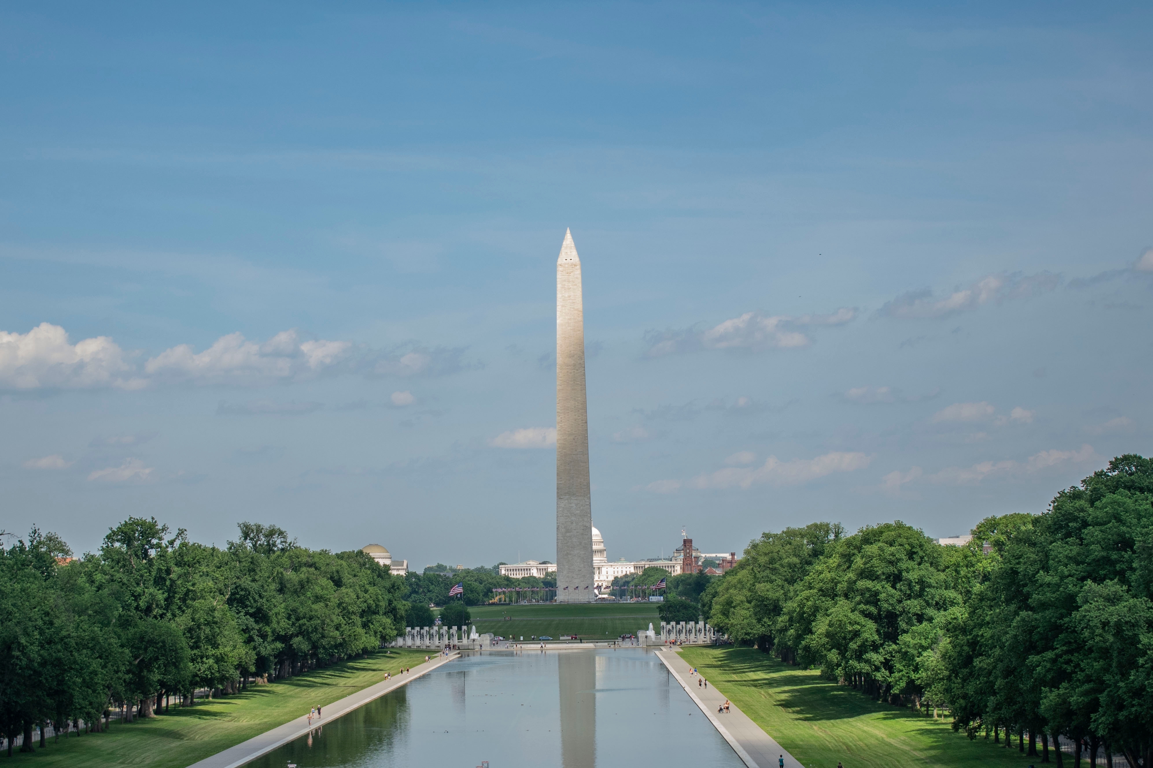 Shutterstock 2494112711 View Of The Washington Monument Taken From The Steps Of The Lincoln Memorial In The Summer.