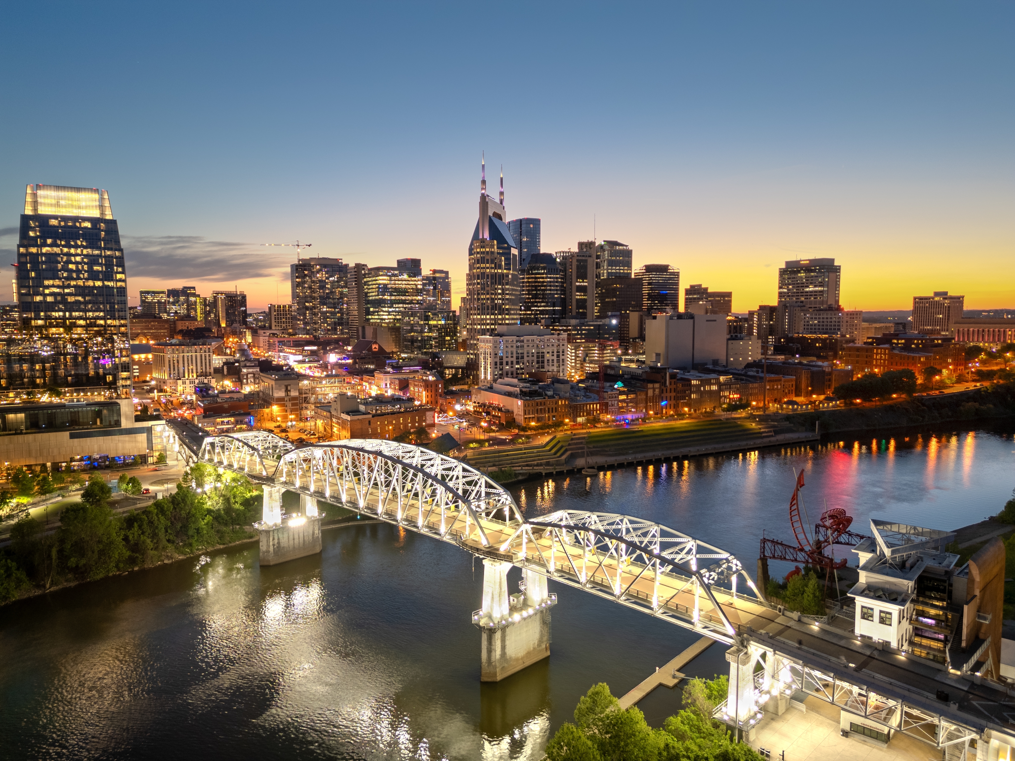Shutterstock 2455297243 Nashville, Tennessee, USA Skyline Over The Cumberland River At Golden Hour.