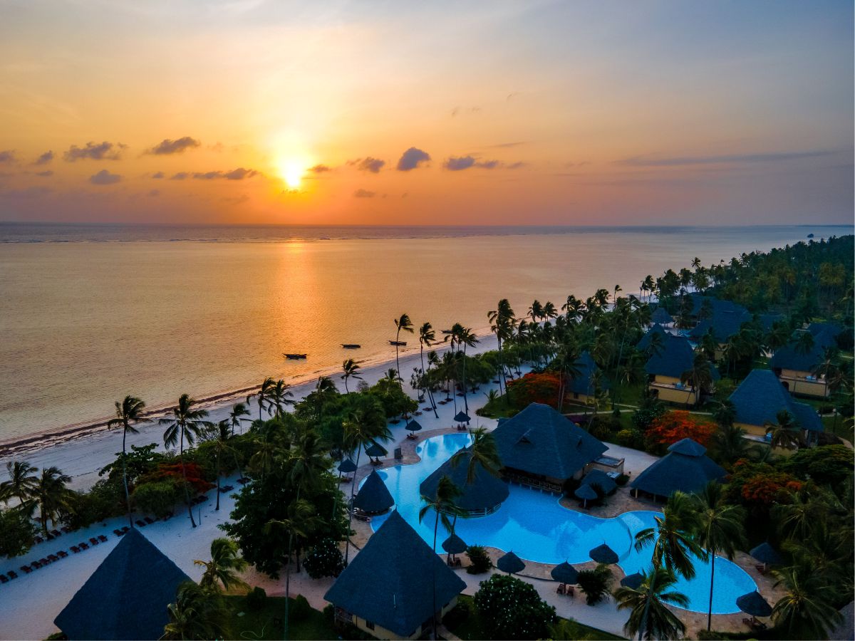 Neptune Pwani Beach Resort & Spa Zanzibar Aerial Swimming Pool And Beach Sunset
