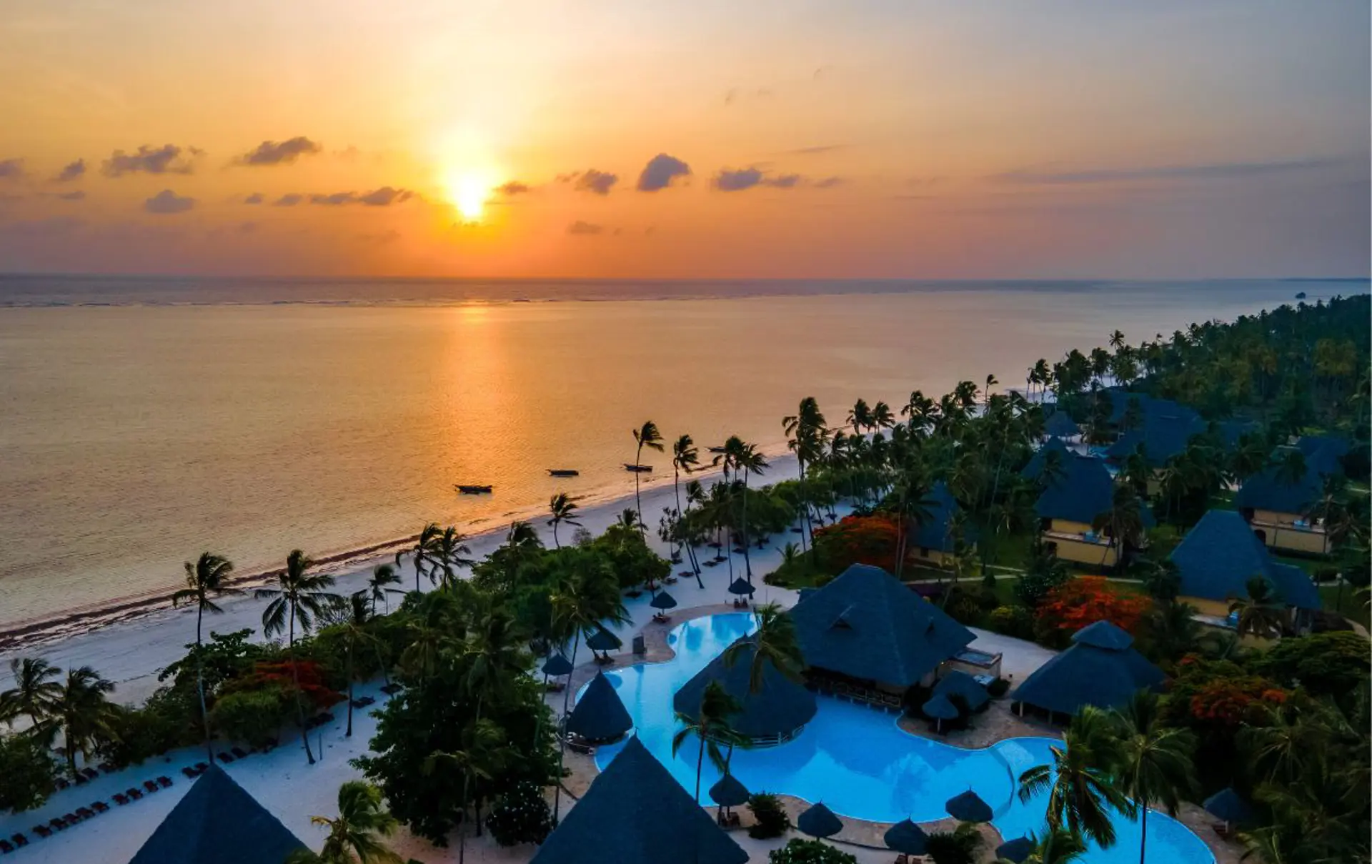 Neptune Pwani Beach Resort & Spa Zanzibar Aerial Swimming Pool And Beach Sunset