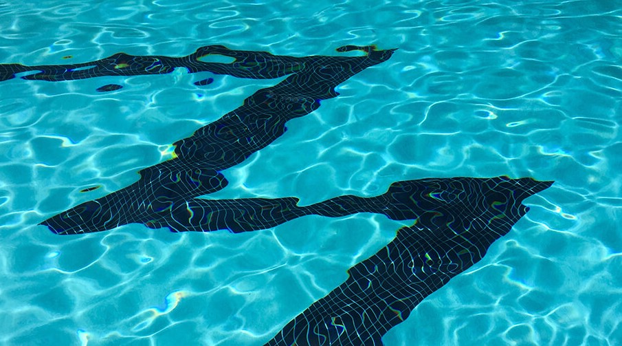 Marseilles Beachfront Hotel Pool Logo