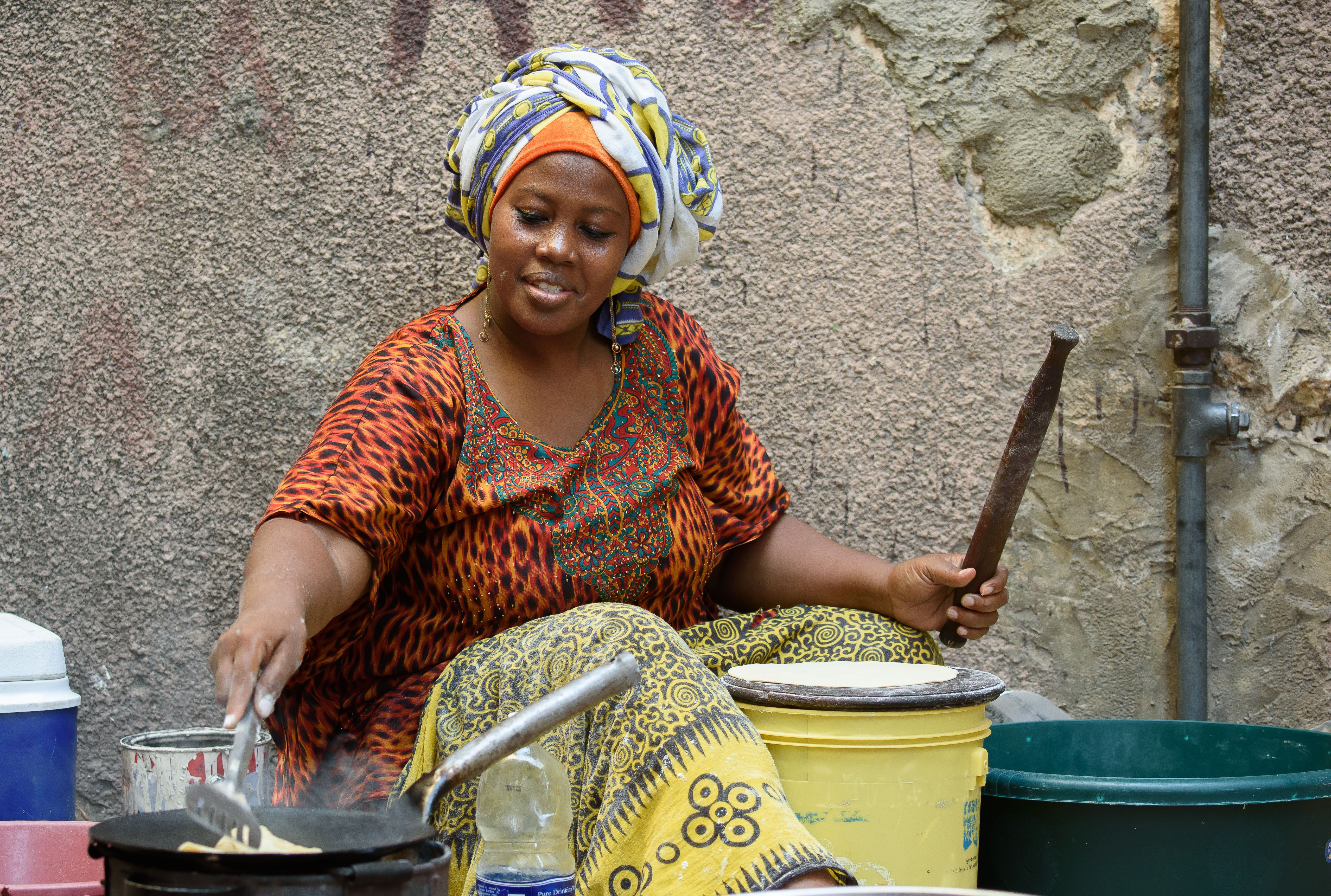Shutterstock 602868641 Stone Town, Tanzania A Women Street Vendor Cooking In The Streets Of The Historic Stone Town On Zanzibar Island, Tanzania On Feb 28, 2017