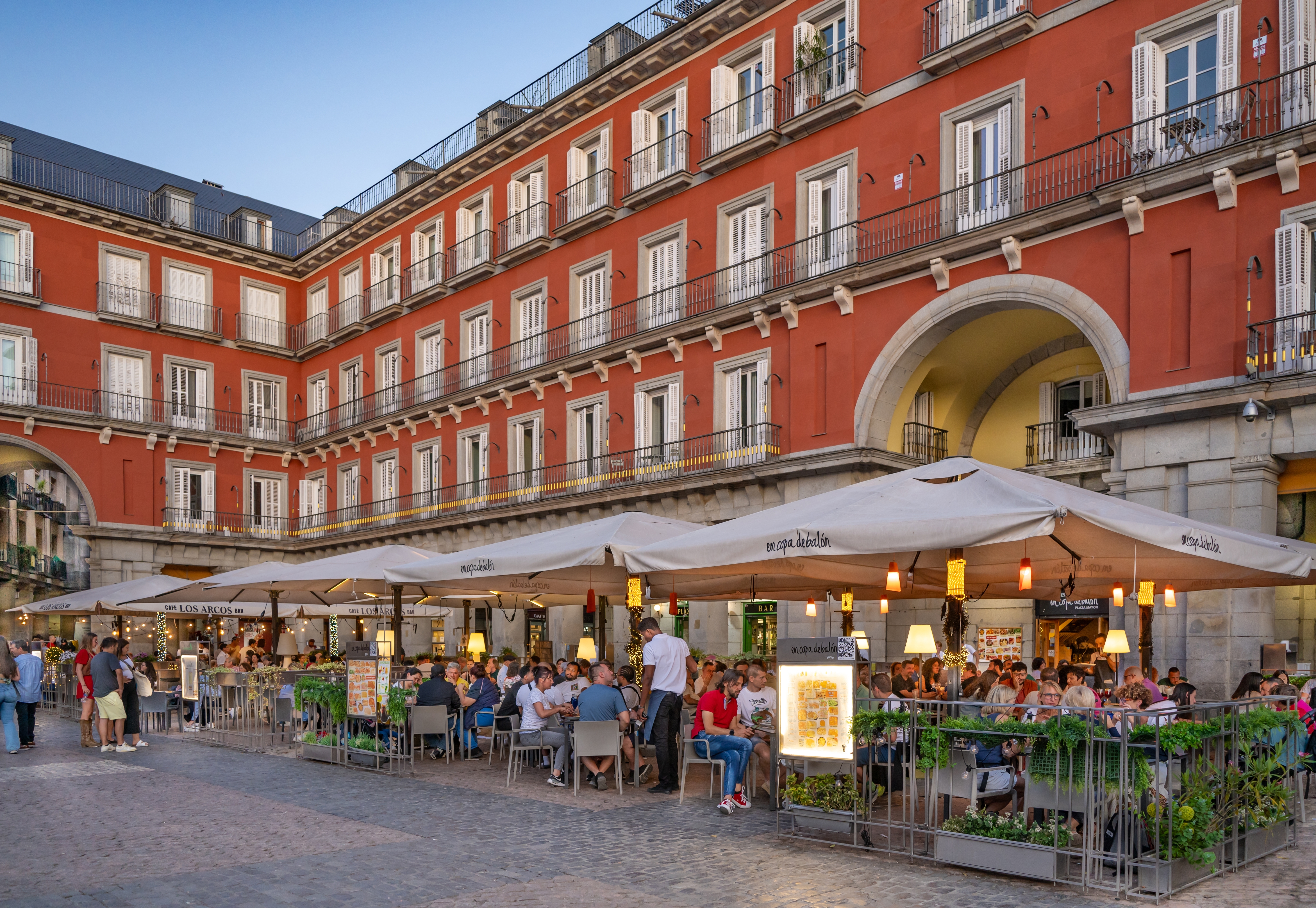 Shutterstock 2501743351 MADRID, SPAIN MAY 20, 2024 Unknown People At Outdoor Restaurant On Mayor Plaza In Madrid, Spain.