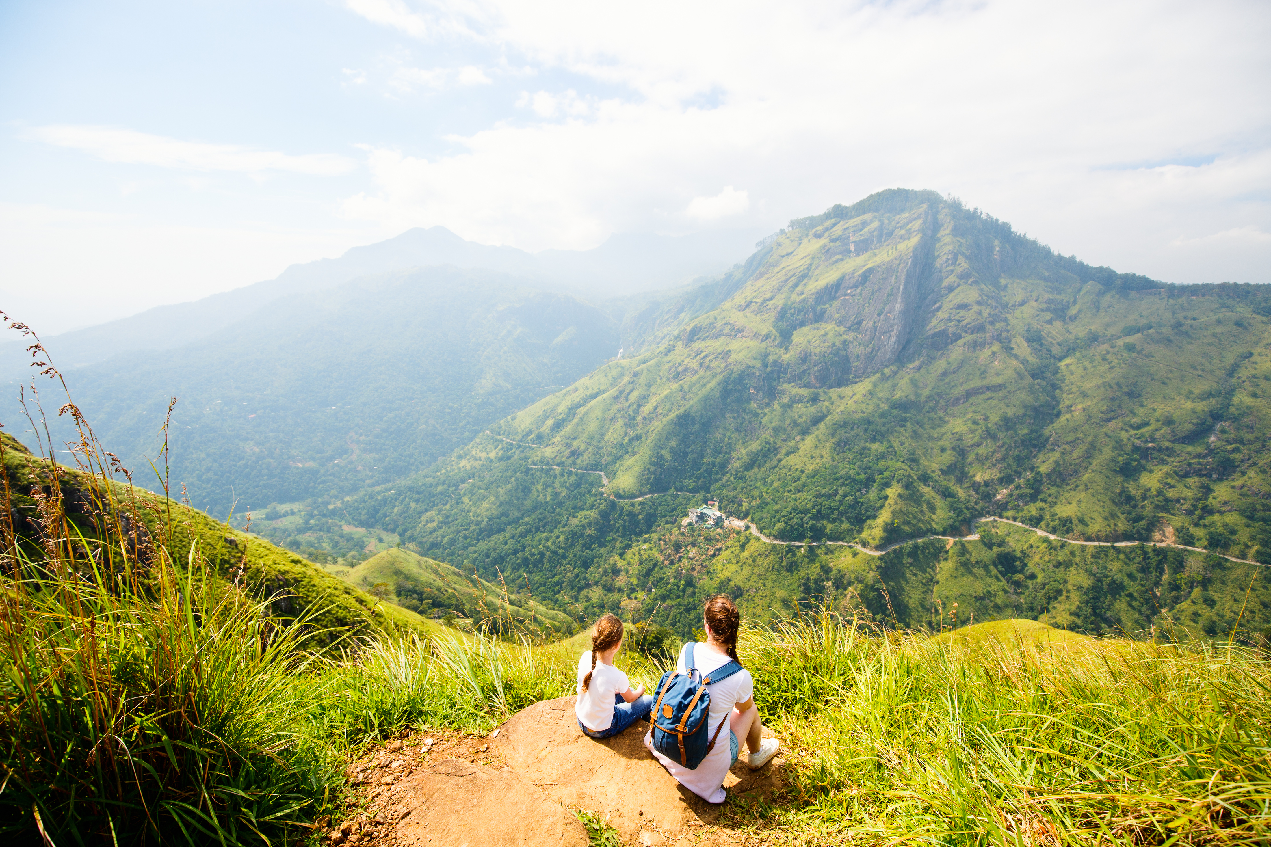 Shutterstock 1699765825 Family Of Mother And Child Enjoying Breathtaking Views Over Mountains And Tea Plantations From Little Adams Peak In Ella Sri Lanka