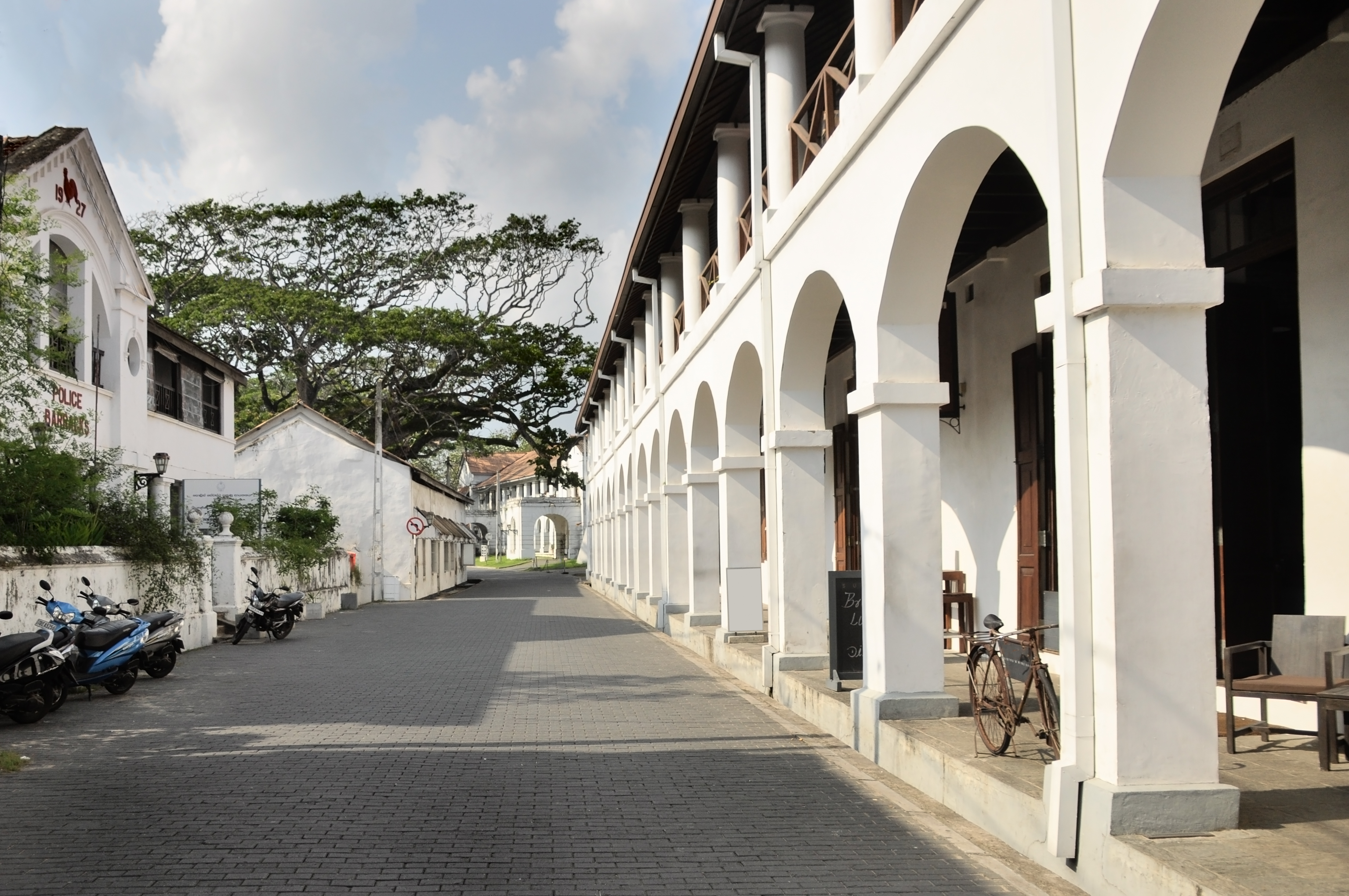 Shutterstock 1315908479 (White Old European Street With Pavement And Arcade Building In Fort Galle Sri Lanka)