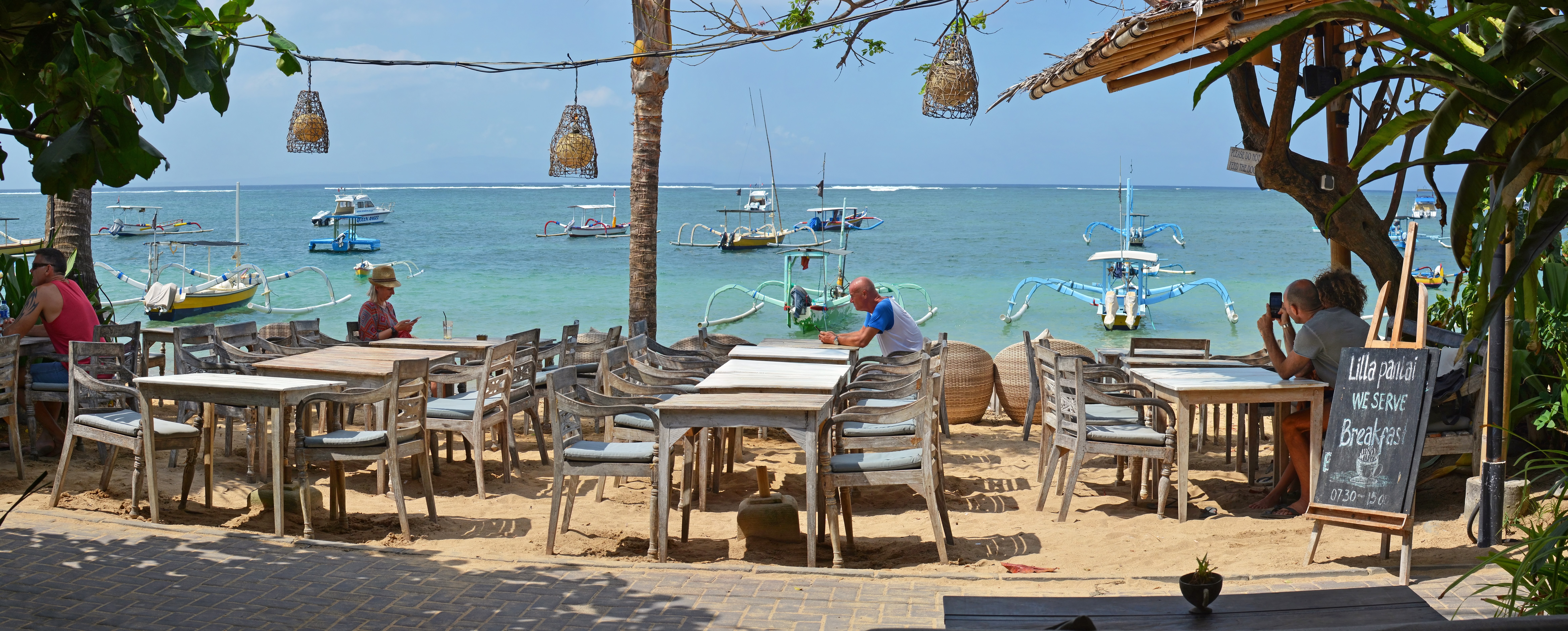 Beachside Restaurant Panorama At Sanur Beach In The Afternoon.