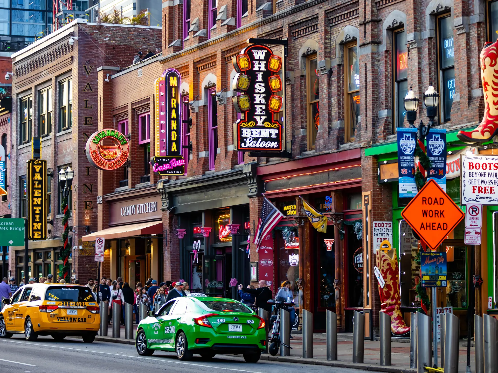 Shutterstock 2418513075 Nashville, TN, USA 12 24 2023 Famous Neon Signs Of Blues Clubs On Beale Street At Day In Downtown Nashville City Attraction
