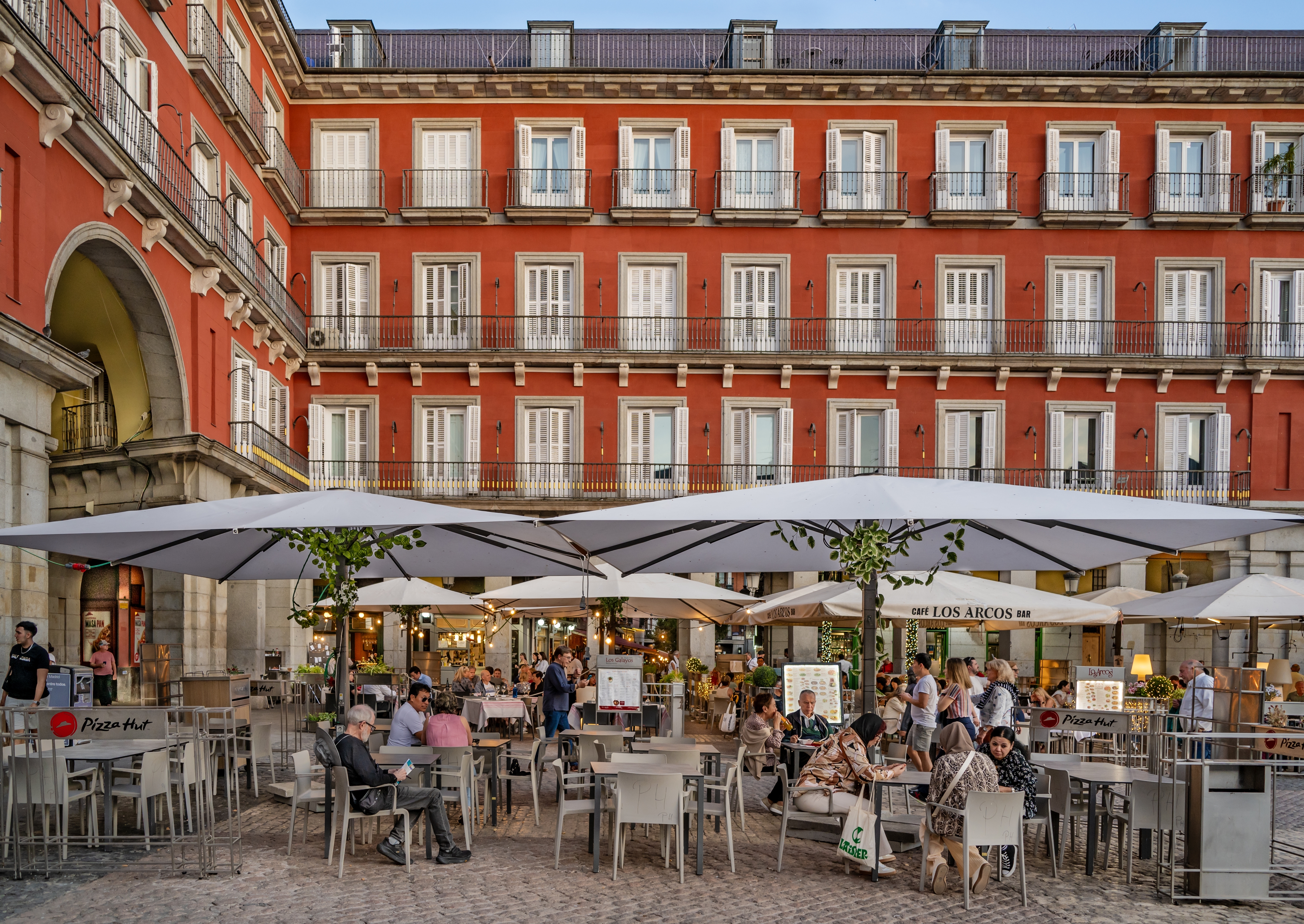 Shutterstock 2501732749 MADRID, SPAIN MAY 20, 2024 Unknown People At Outdoor Restaurant On Mayor Plaza In Madrid, Spain.