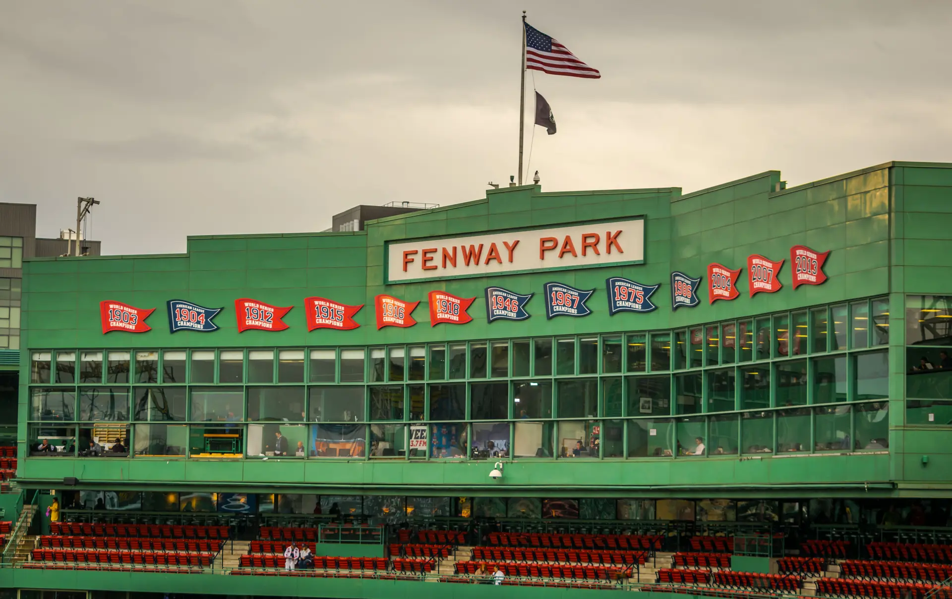 Shutterstock 1276985191 Boston, MA 93018 The Press Box At Historic Fenway Park, With Banners Representing The Team's Division And World Series Championships
