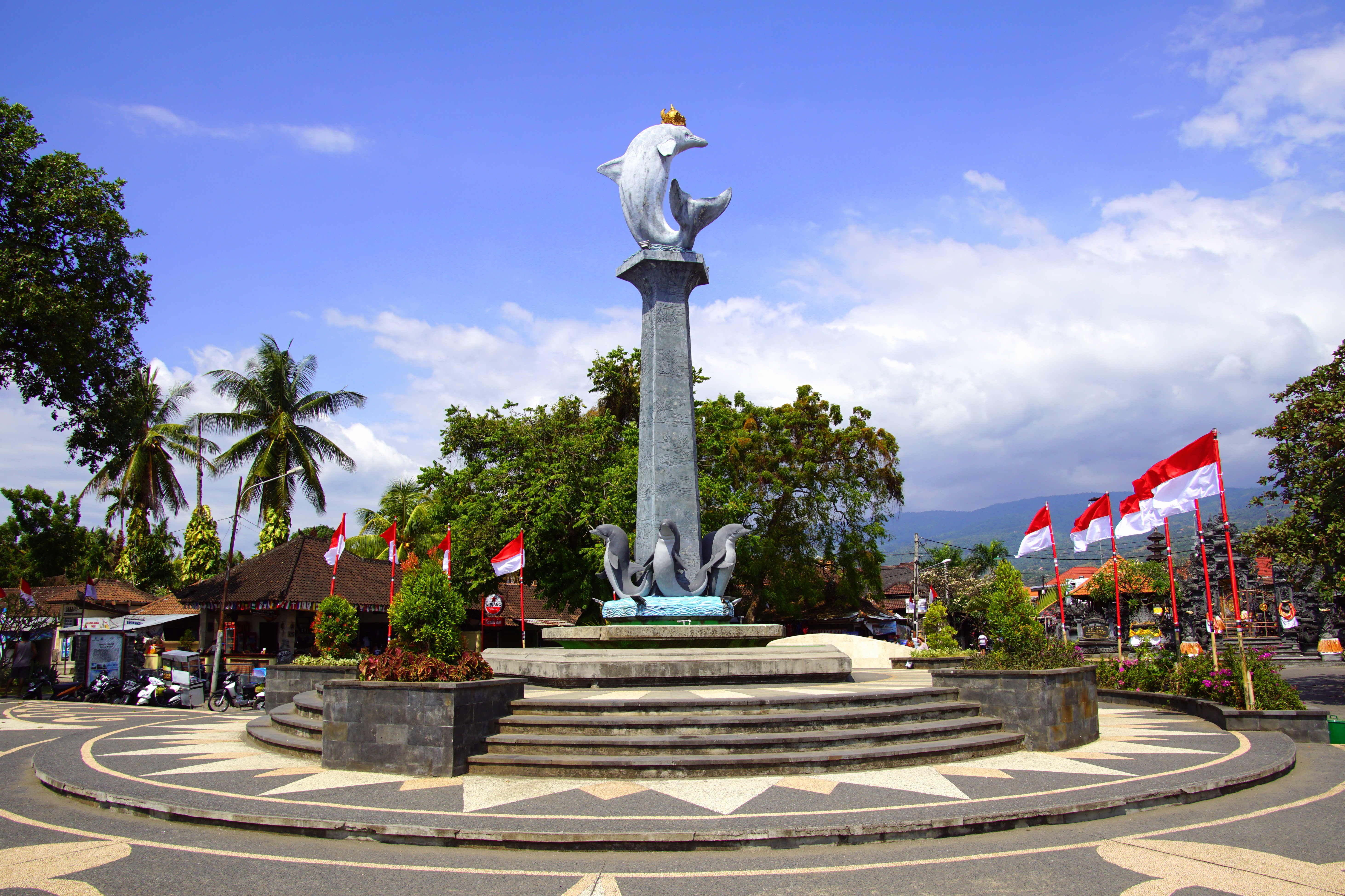 Shutterstock 1161676132 (Lovina, Bali, Indonesia August 8, 2018 Lovina Beach Dolphin Statue Against A Prtly Clouded Sky.)